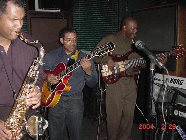 Wake Campbell - Sax; Ron Smith - Guitar; Chris Rhodes - Bass
