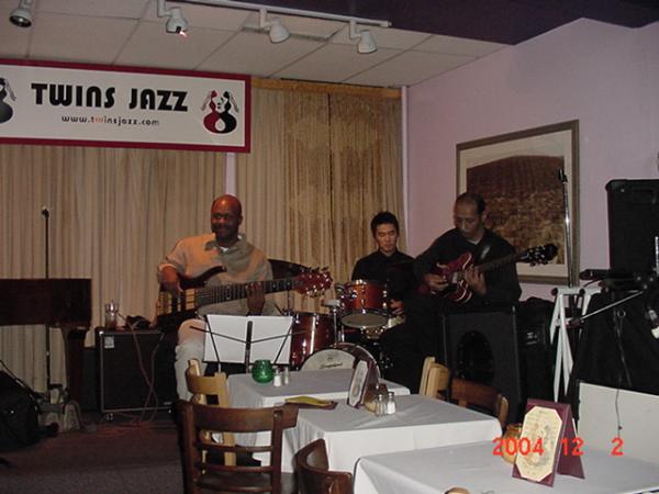 Twins Jazz - Washington DC.  Chris Rhodes - Bass; Joo - Drums; Dennis Silver - Guitar.