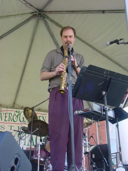 Kevin Edmonds - Sax

Kevin currently teaches music part-time at Mountain State University.  He holds a Bachelor of Music degree from the prestigious Berklee College of Music (majoring in Jazz Composition & Arranging and studied saxophone under George Garzone and Andy McGhee).  He also holds a Master of Music degree from the University of South Carolina (majoring in "Classical" Composition).  Kevin has played or composed for virtually every style of music over his 20 plus years as a professional musician (variety Dance Bands, Marching Bands, Jazz Big Bands, Concert Orchestras, Dixieland Bands, even an A Capella Vocal Quartet).  He also wrote a specialty jazz and classical column for the Frederick News-Post for a period of time.  Kevin relocated to the DC metro area from Pittsburgh in 2000 and recognized there was a new opportunity to perform jazz fusion.  "As soon as I relocated, I realized there was a realistic possibility to do the type of music I had always most wanted to do.