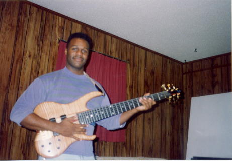 This is the earliest picture I have with me and my then "New" 1993 Ken Smith Bass; photo from the fall of 1993 in Pensacola Florida.
All my friends were asking why did I spend so much on a bass? The $3K I used for a 486 33Mhz Computer - that was justified - now in the trash!
This is a BMT G bass, one of the first ones. It sounds better every year! I believe the wood is drying out or something.